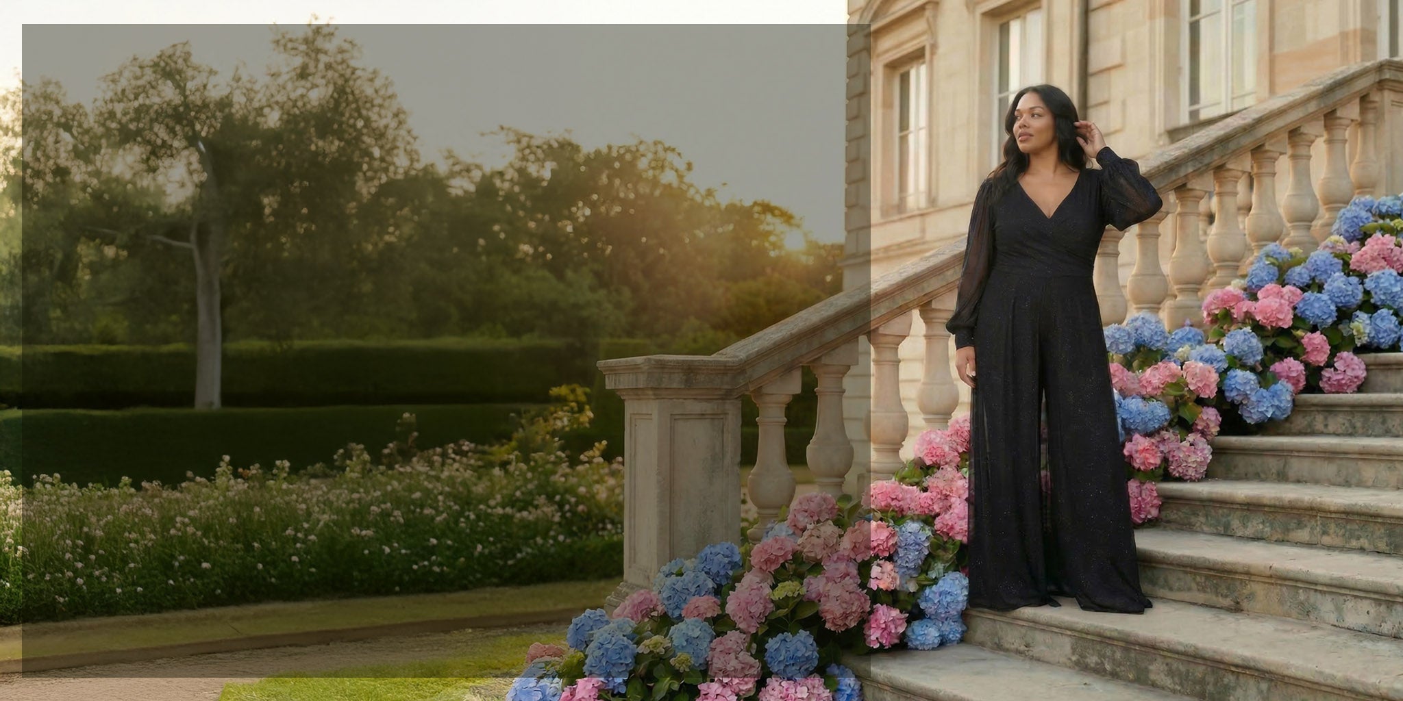 woman in an evening black jumpsuit standing on a staircase